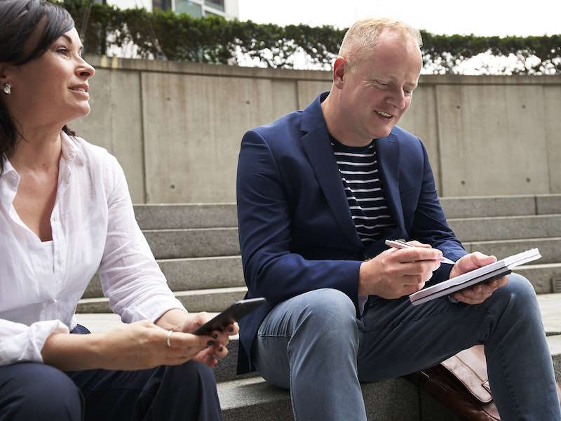 boss guiding an employee