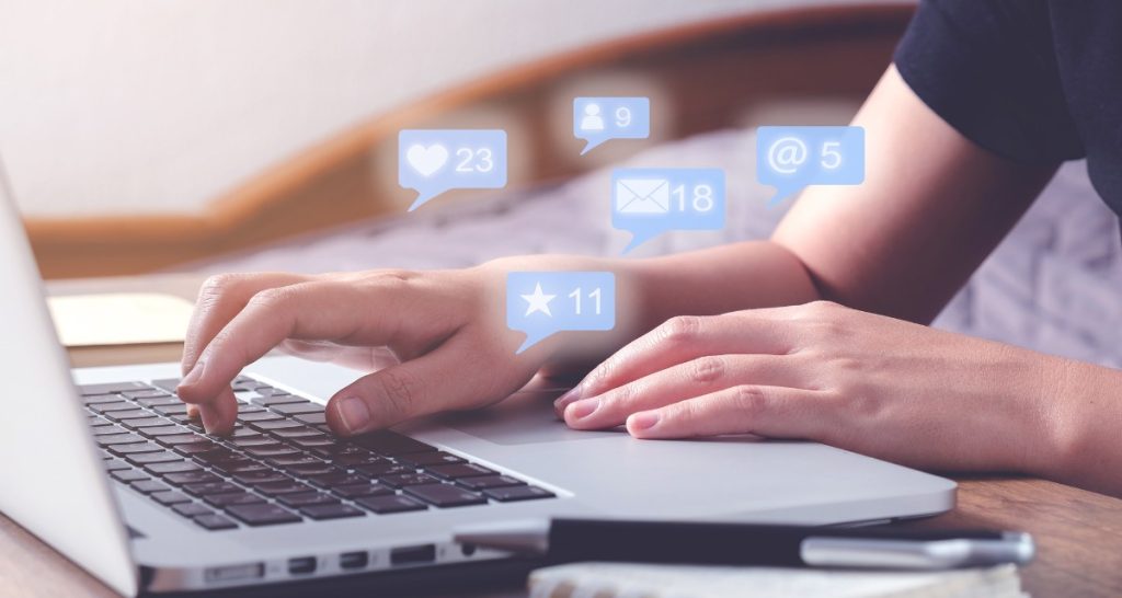 Employee working on social media marketing